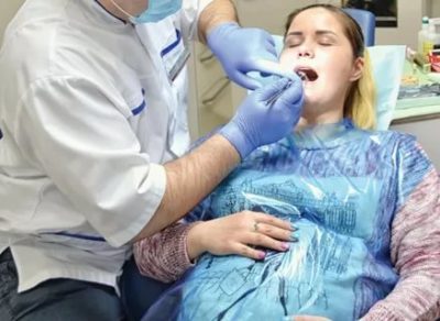 На каком сроке беременности можно удалить зуб